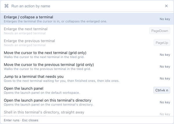 The command palette: each action with a description and its key, or "No key"; actions that need an enlarged terminal are greyed out
